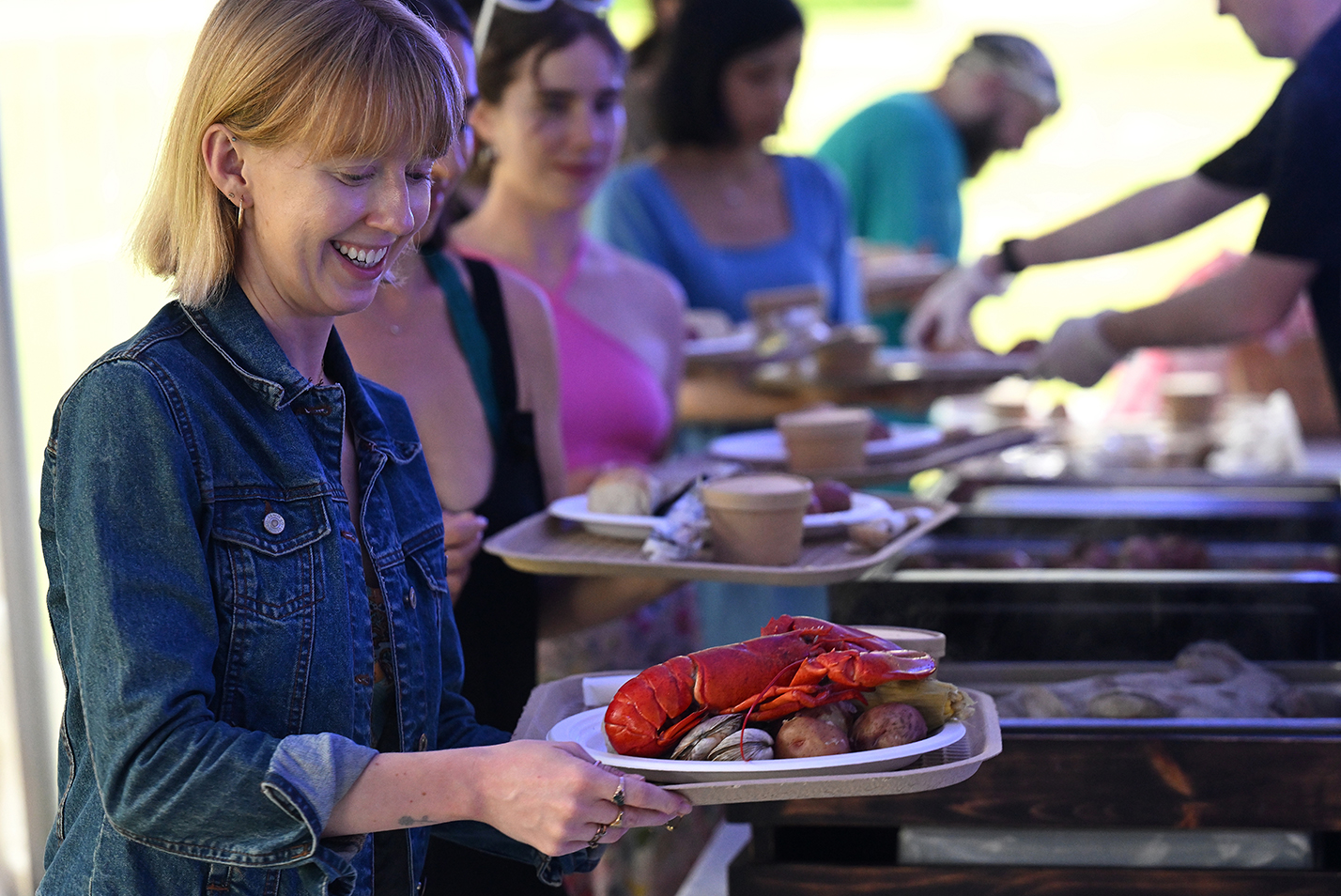 Hungry alumni in line for lobsters at the Reunion 2023 Lobsterbake