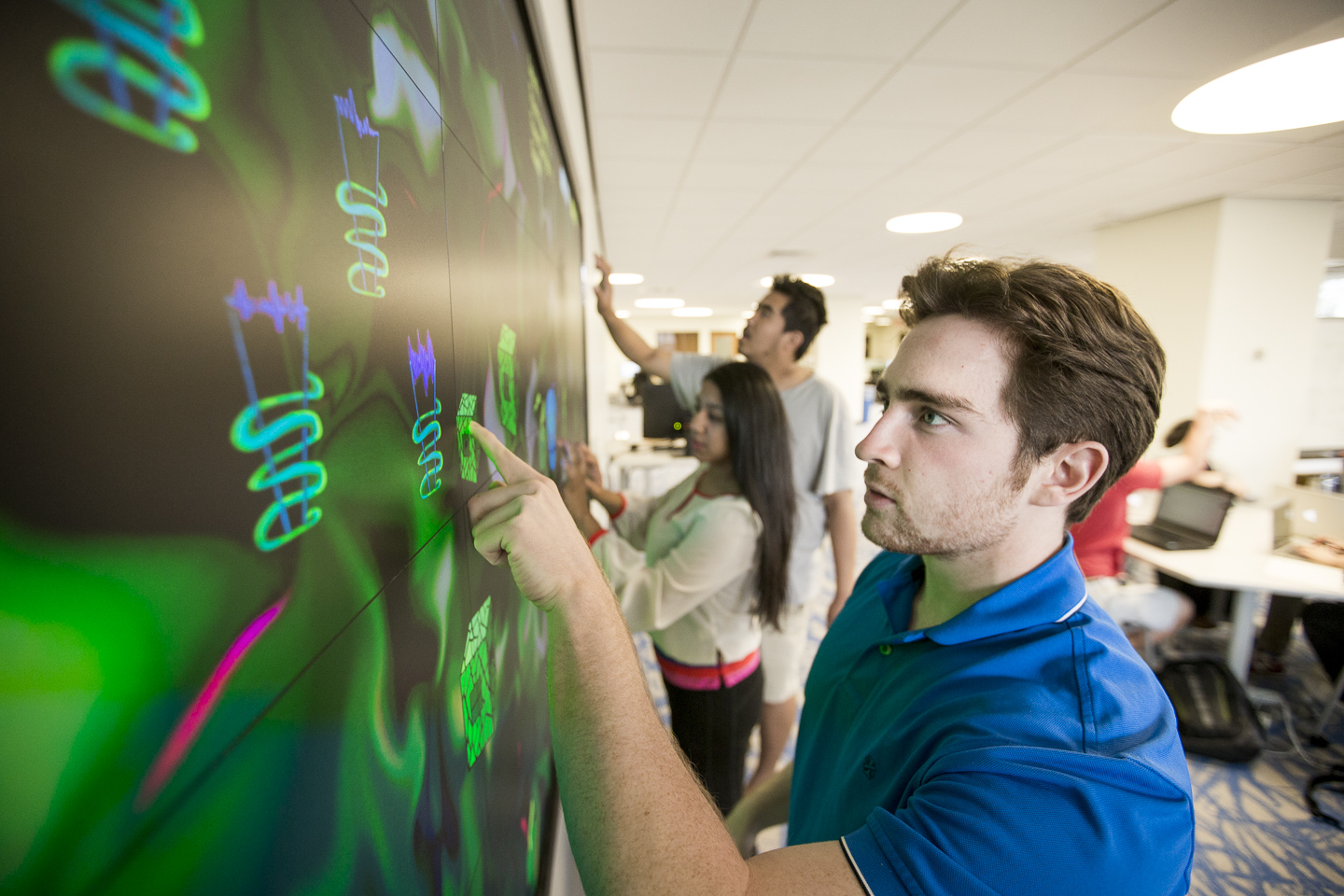 Student working on Visualization Wall