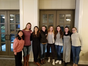 Lexi poses with seven girl friends at the Sophomore Leadership Dinner