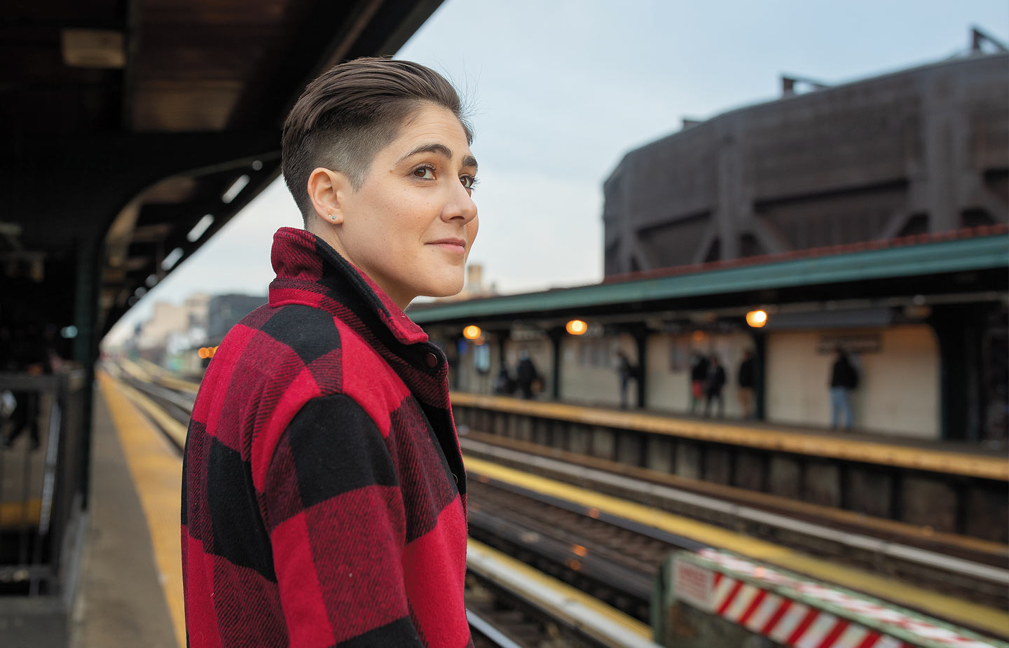 Image of Casey Corn ’10 waiting for a train