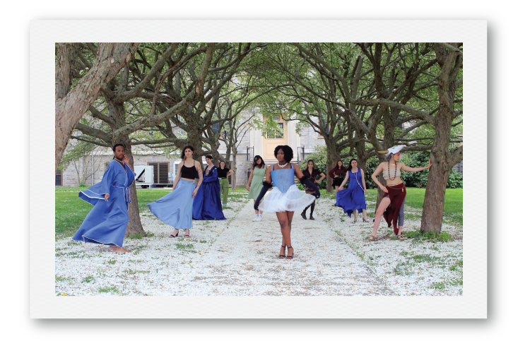 Students posing by Fanning to show off costumes