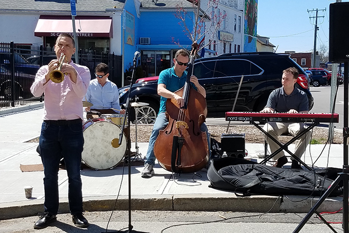 The East Coast Ramblers play on Golden Street to kick off the walk. 