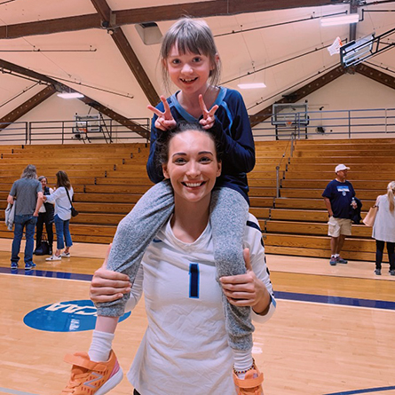 Bridget Fatse ’22 with Team IMPACT's Katalina in 2019.