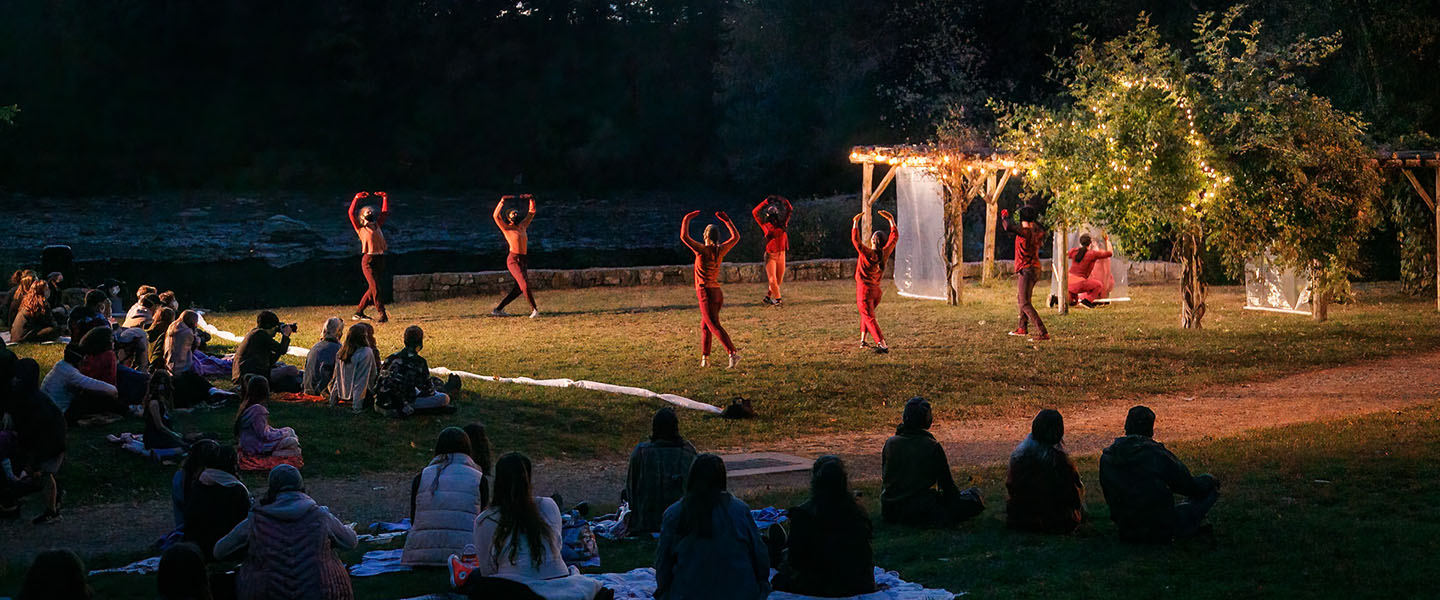 Dancers perform Reach, a work choreographed by Lisa Race, in the Arboretum.