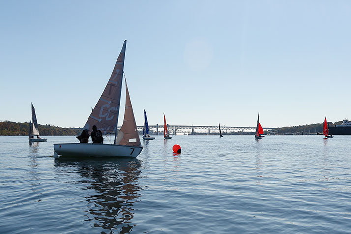 Sailboats on the Thames River as Conn competes against Boston College in a head-to-head regatta