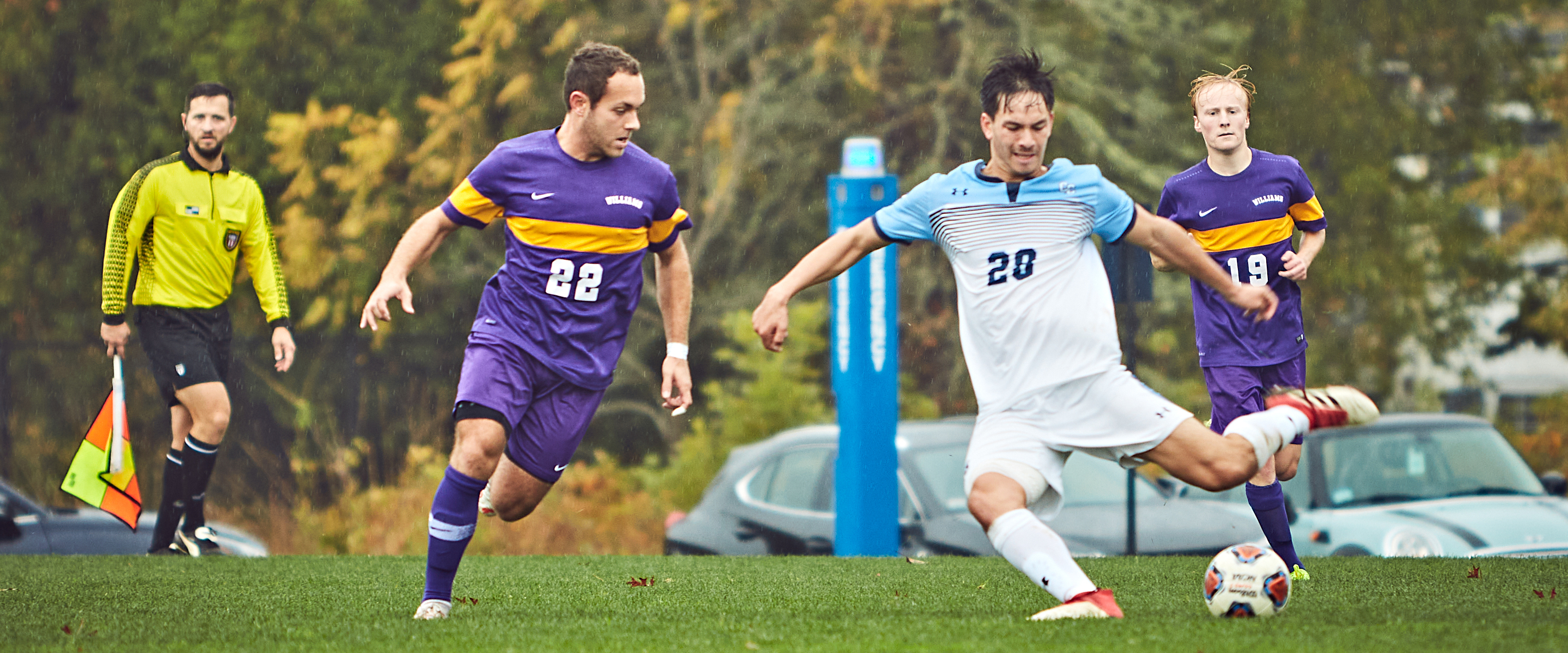 A player winds up to kick the ball. 