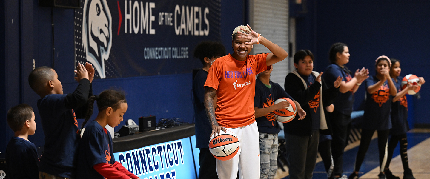 Sun guard Courtney Williams prepares to start a drill during the clinic for local children.