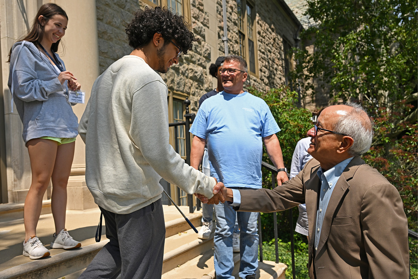 Interim President Wong greets students and staff on campus