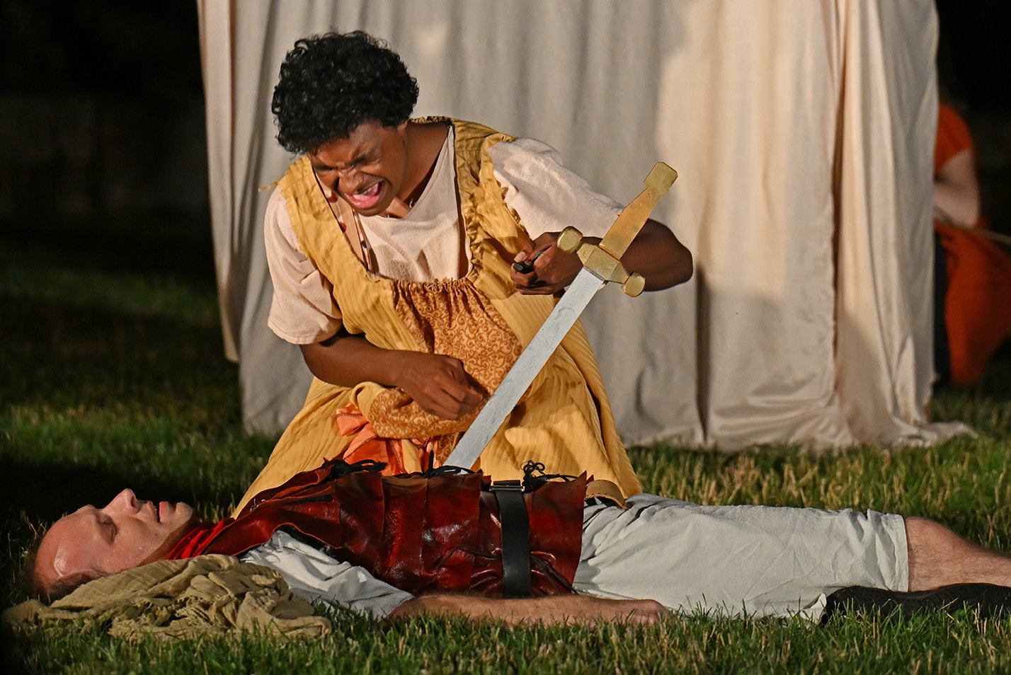 Actors perform during Flock Theater's Shakespeare in the Park in the Arboretum