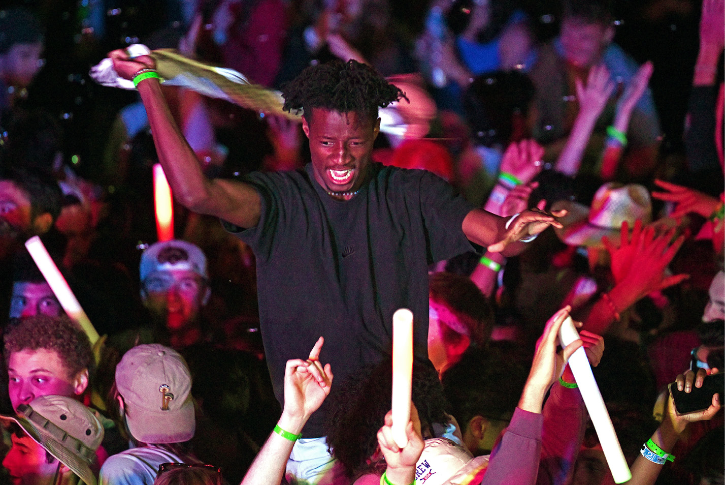 Student waving a shirt at Floralia