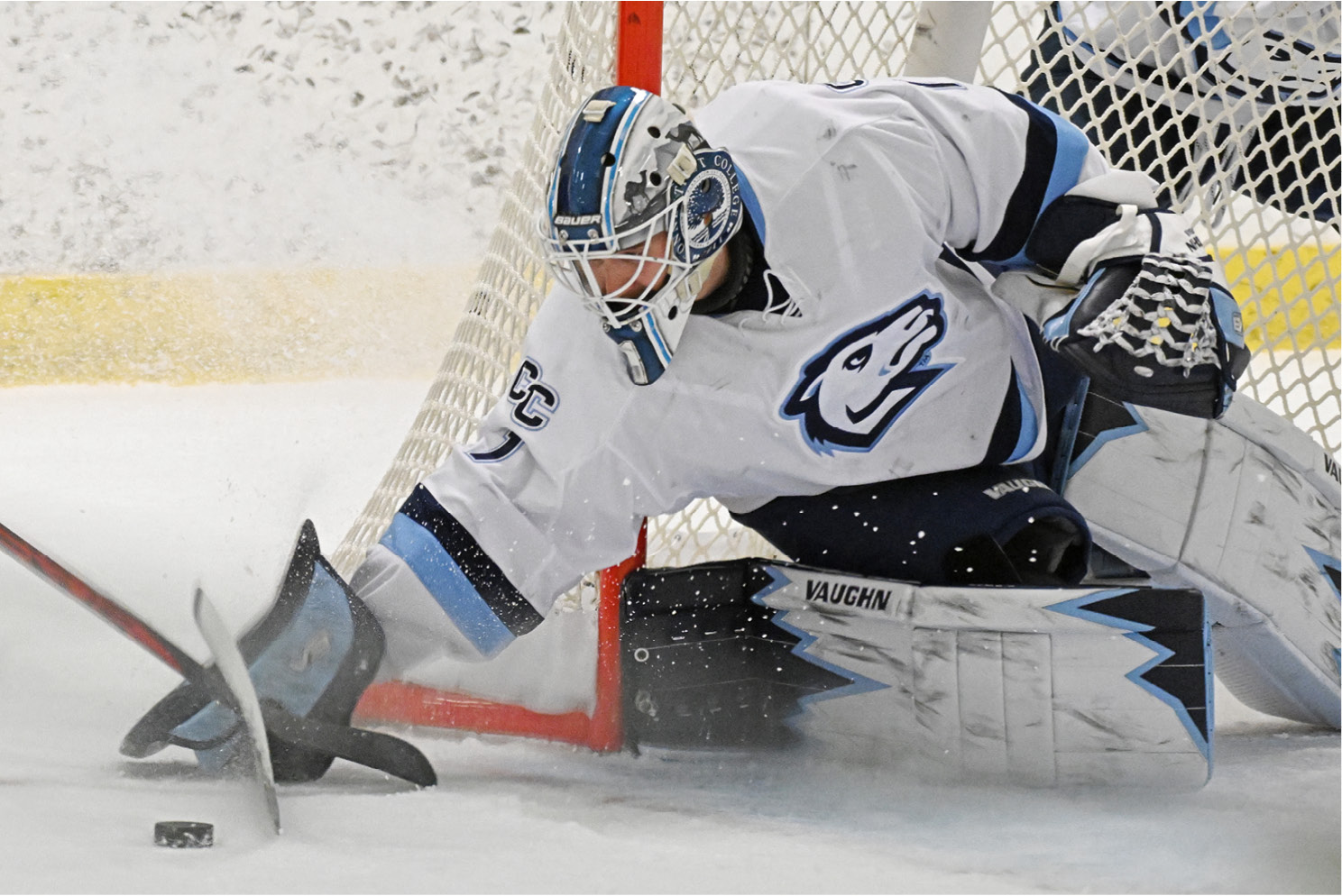 Ice Hockey Goalie Making a Save