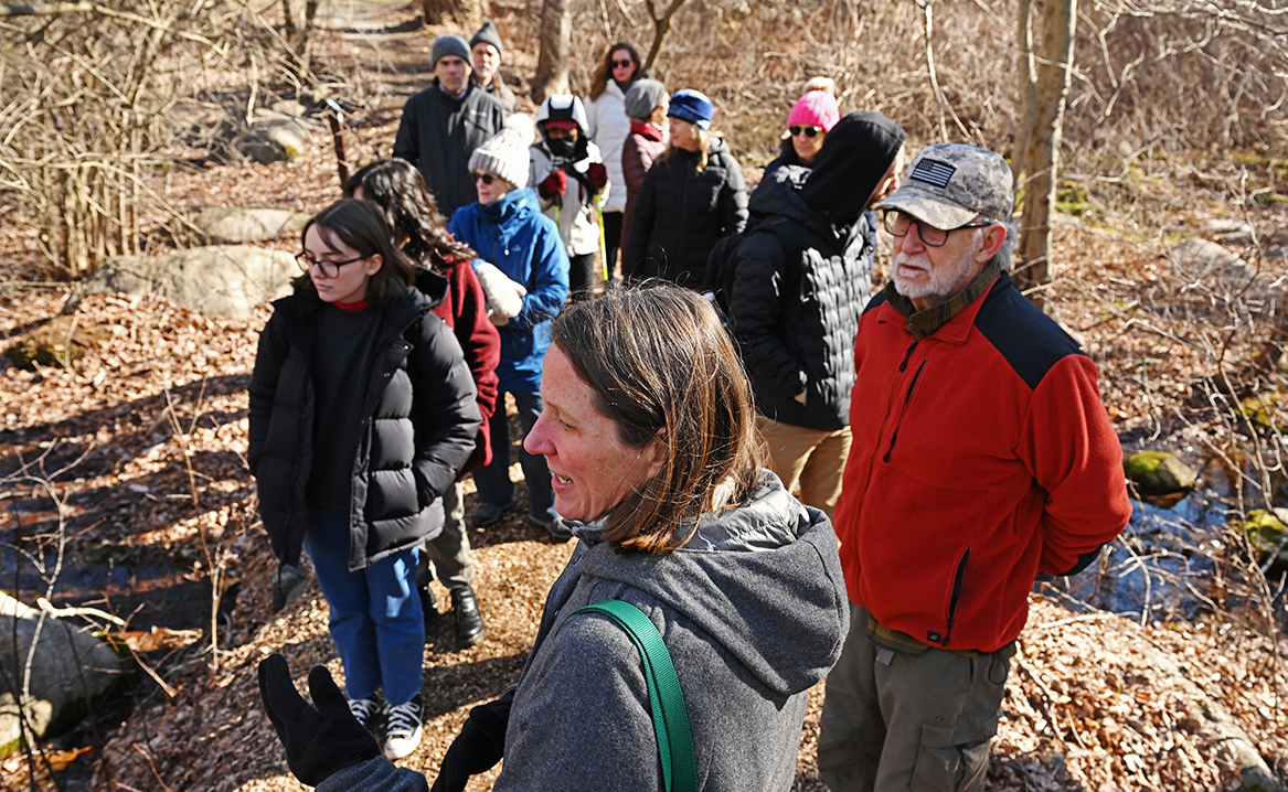 Redfern leads a tour of the arboretum.