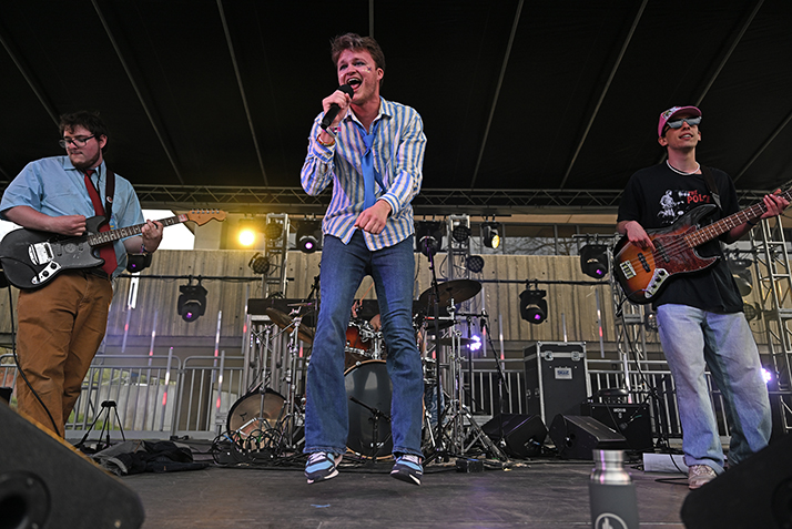 A student band performs onstage