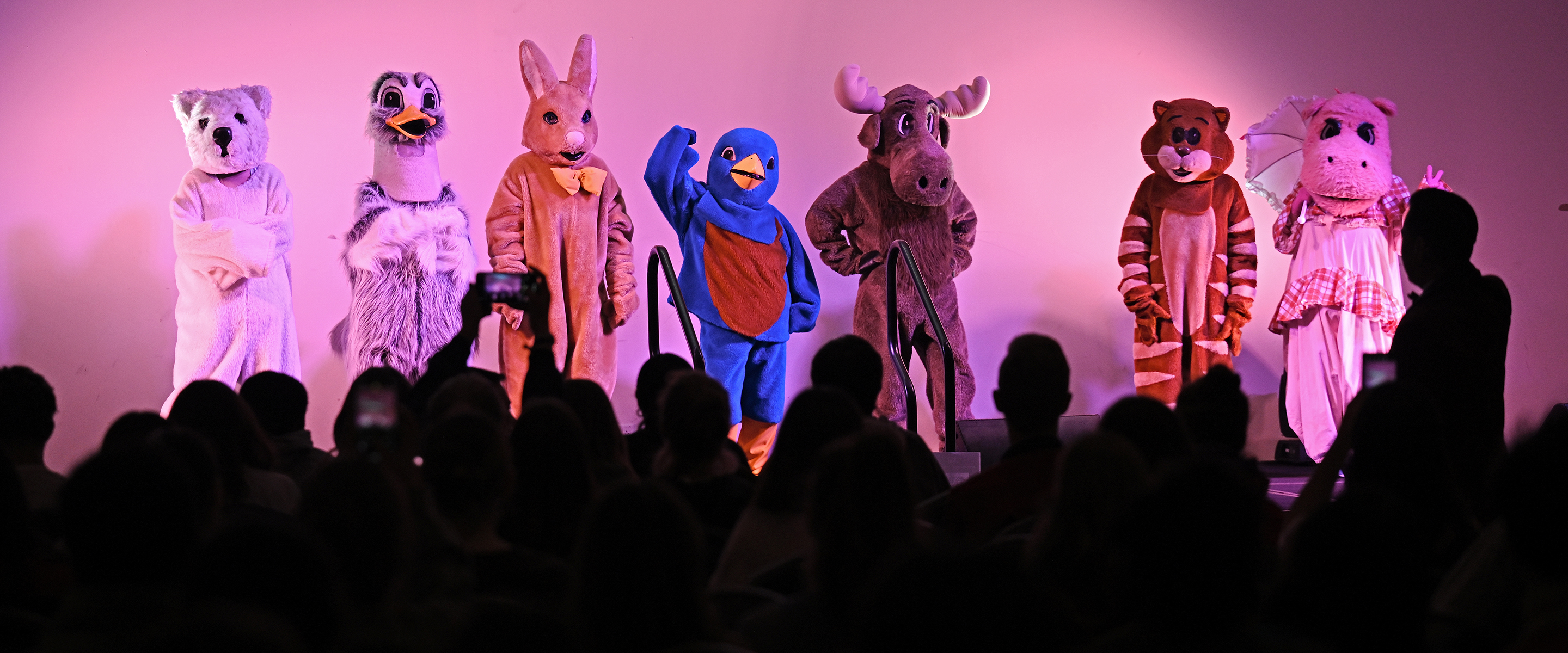 Singers in costume on stage