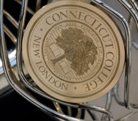 The Connecticut College seal on the mace