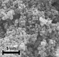 Powder X-ray diffraction pattern and SEM image of sub-micron-size particles.